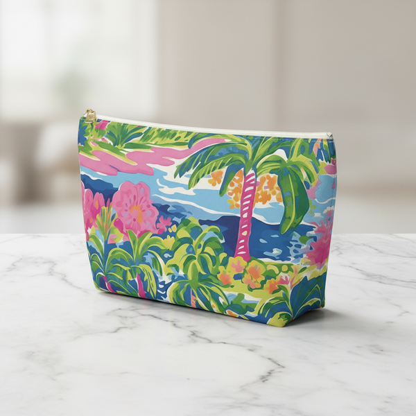 Colorful pouch with tropical design on a marble surface
