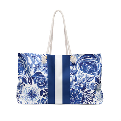 Back view of the Lexington Weekender Tote Bag with blue floral pattern and white straps on a white background