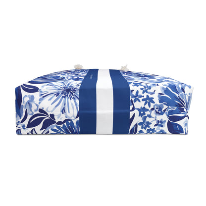 Bottom view of the Lexington Weekender tote with blue floral pattern and white stripes on a white background