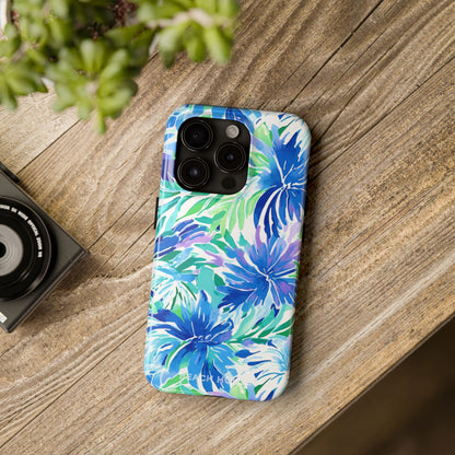Longboat Tough Case for iPhone with blue and green floral pattern on a wooden surface