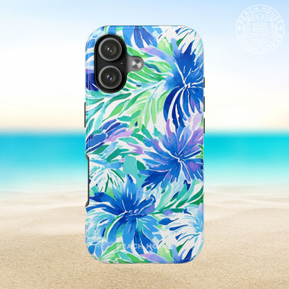 Longboat Tough Case for iPhone 17 with blue and green floral pattern on a beach background