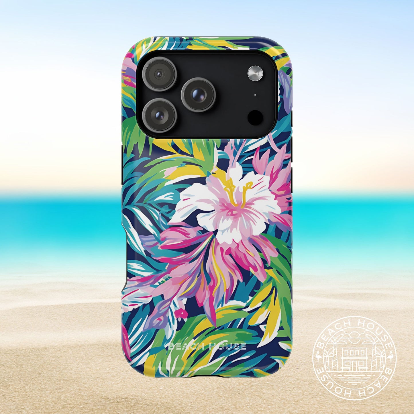 Phone case with colorful floral design on a beach background