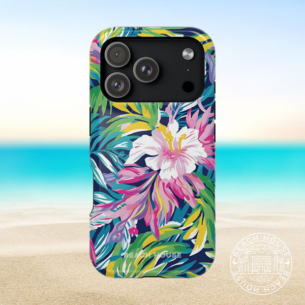 Phone case with colorful floral design on a beach background