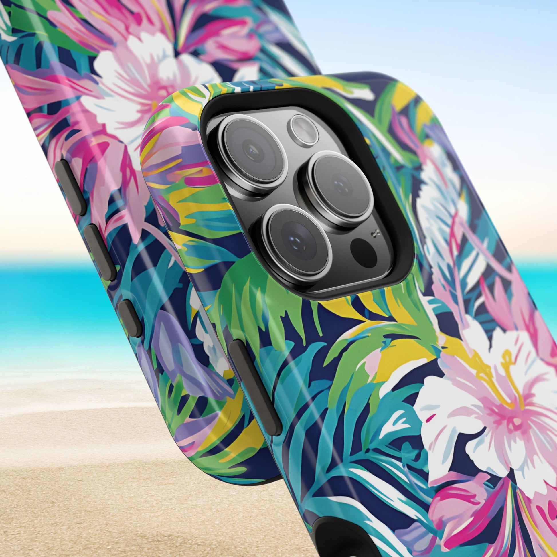 Playa Hermosa MagSafe Tough Phone case with tropical floral design on a beach background