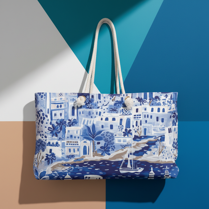 Santorini Weekender tote bag with blue and white tropical pattern on a multicolored background