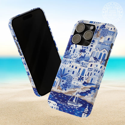 Front and back view of the Santorini Slim Case for iPhone with beach house design on a sandy background