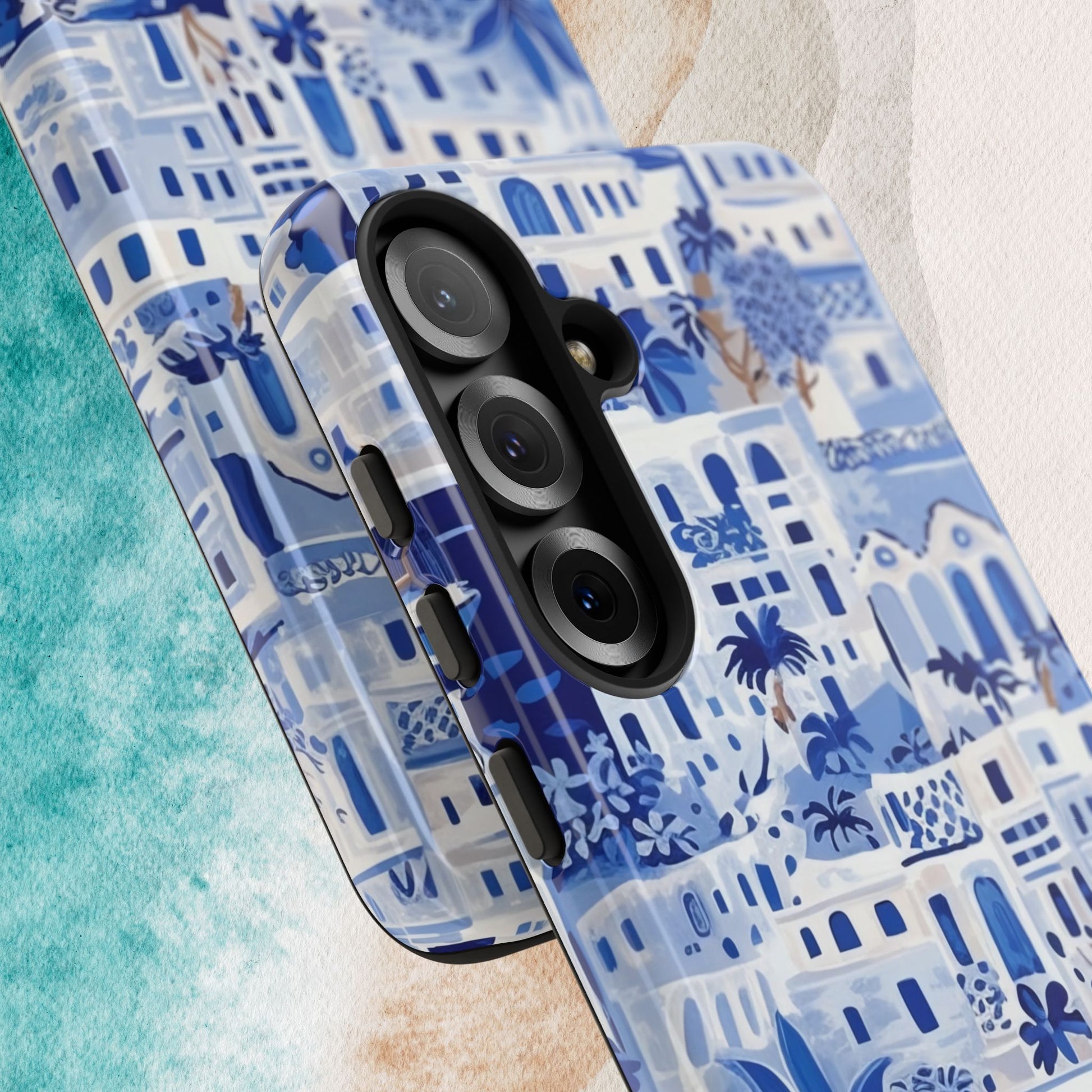 Close up views of the Santorini Tough Case for Galaxy with blue and white architectural pattern on a textured surface