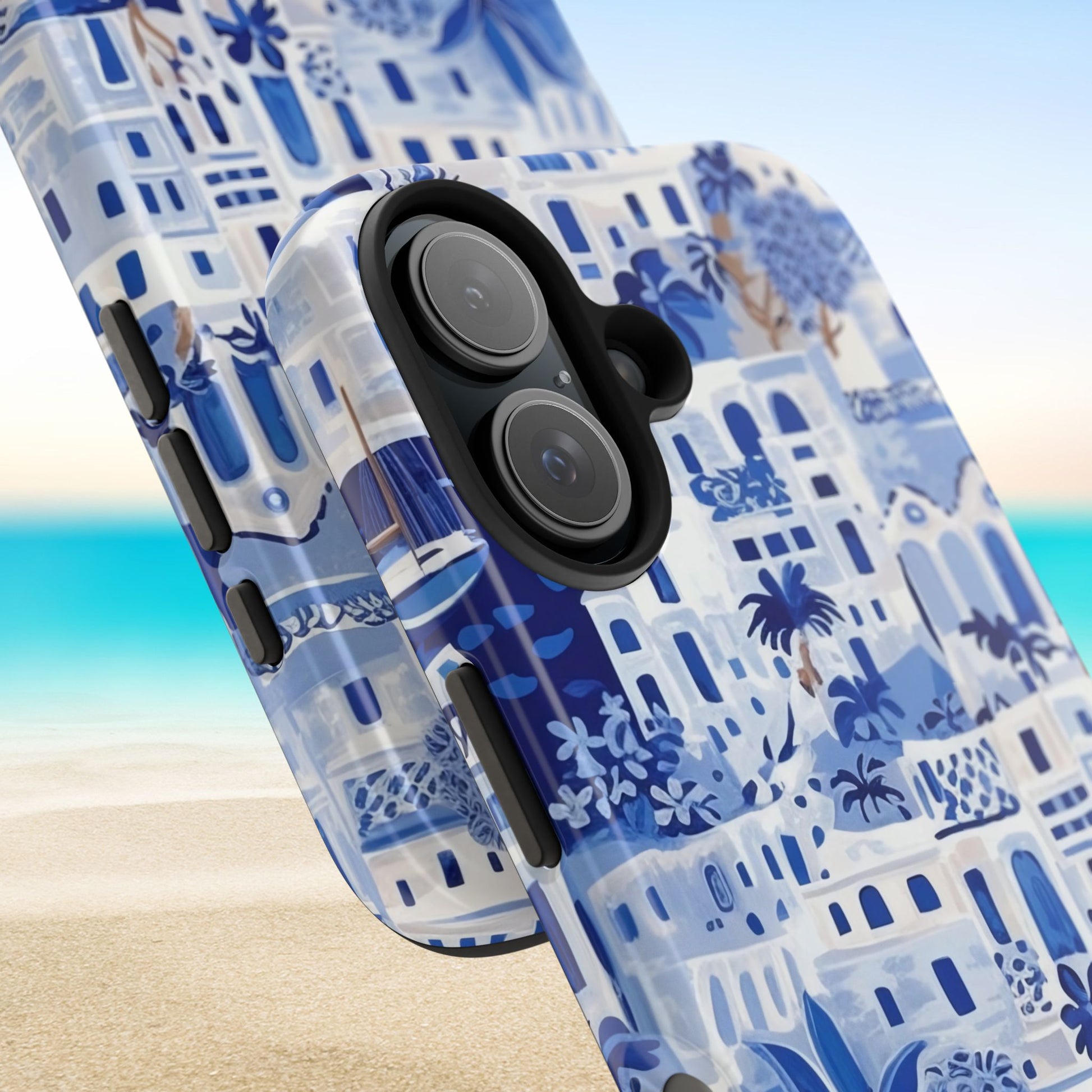Santorini Phone case with blue and white tropical pattern on a beach background