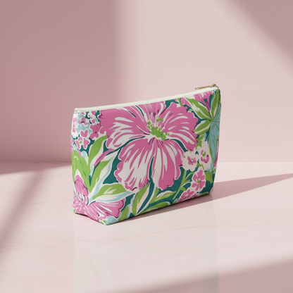 Floral patterned Seaside Accessory Pouch on a pink background