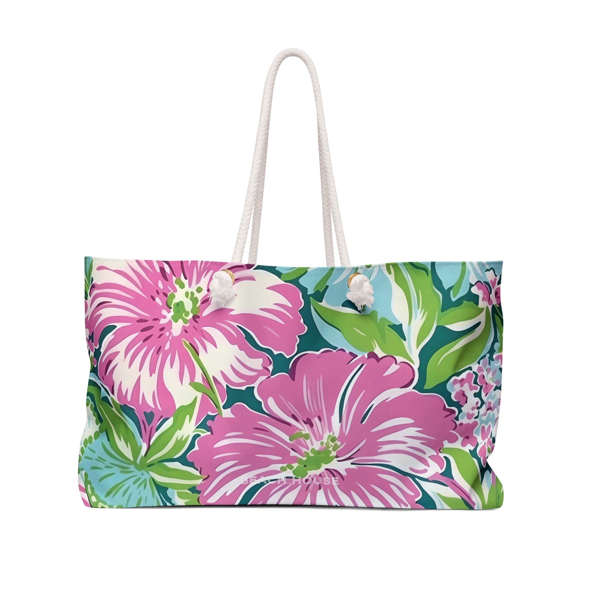 Front view of Seaside Weekender Tote Bag with pink flowers on a white background