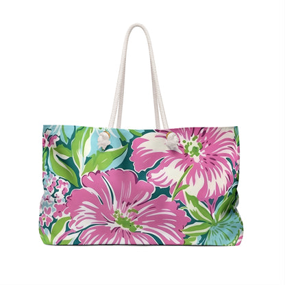 Back view of Seaside Weekender Tote Bag with pink and green flowers on a white background
