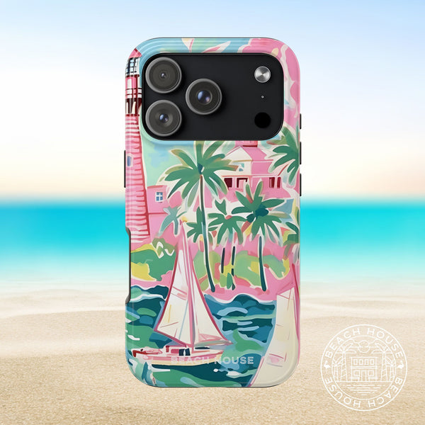 St. Simon Tough Case for iPhone 17 Pro with tropical design featuring palm trees and a sailboat, set against a beach background.