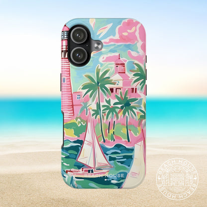 St. Simon Tough Case for iPhone 17 with a tropical design featuring a lighthouse, palm trees, and sailboat on a beach background.