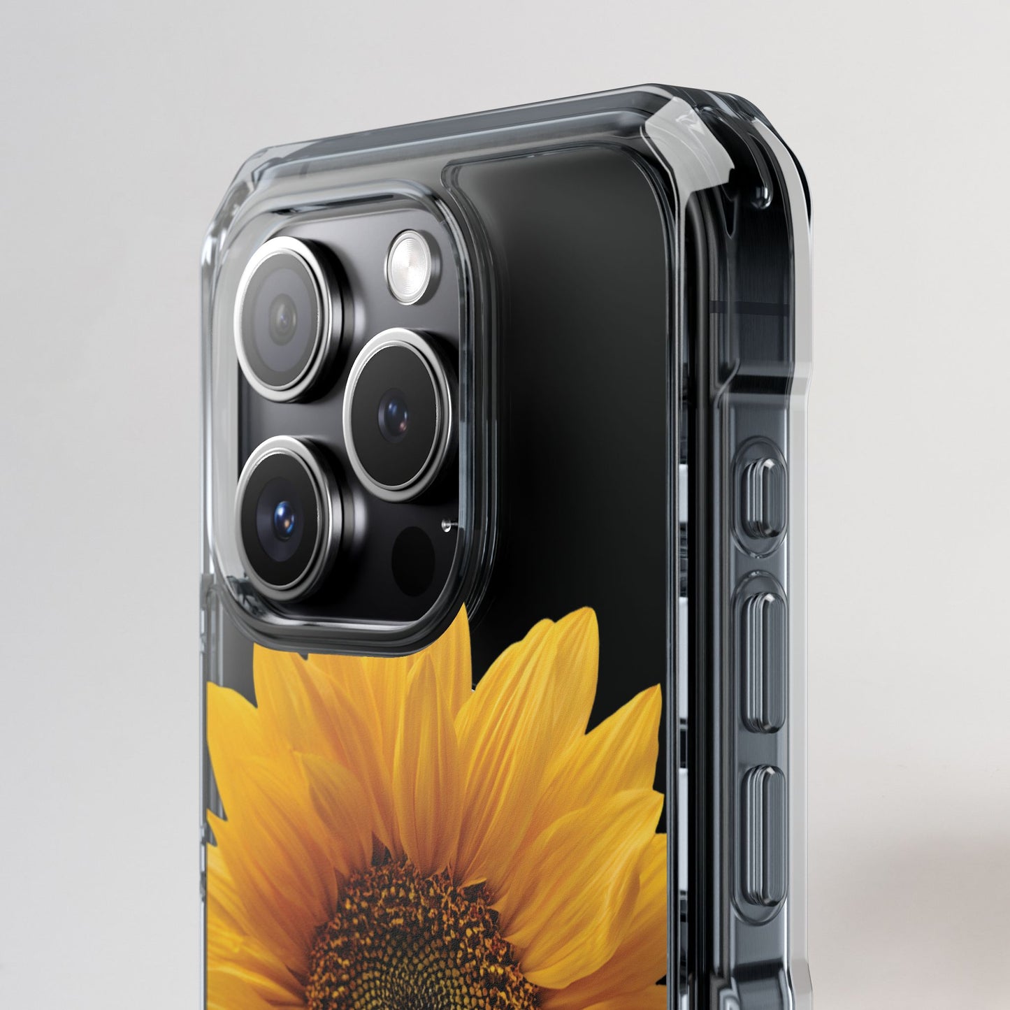 Phone case with sunflower design on a gray background