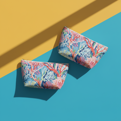 Two floral-patterned pouches on a blue and yellow background