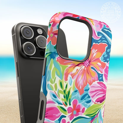 Tropical Waikiki phone case next to a iPhone, with a beach background
